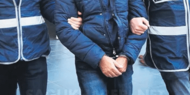 gözaltı kelepçeli